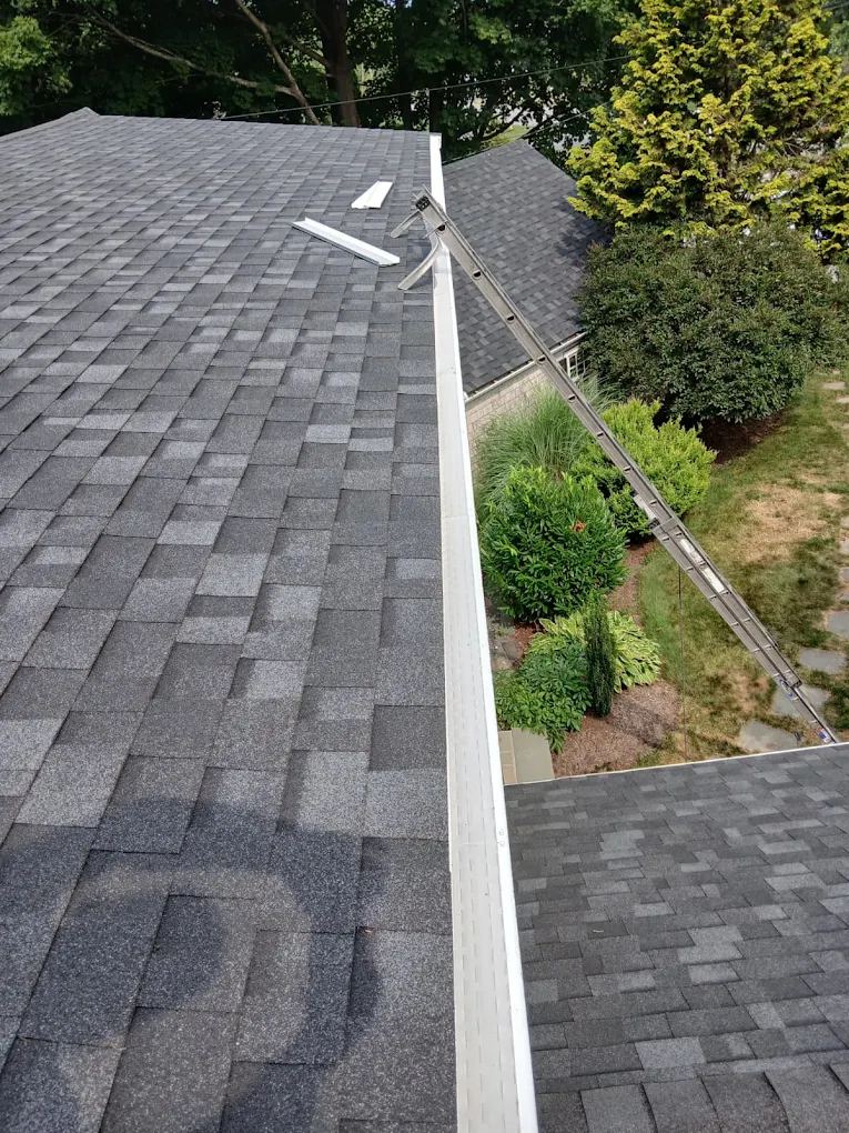 Gutter guard installed by Mr. Gutter along a roof edge