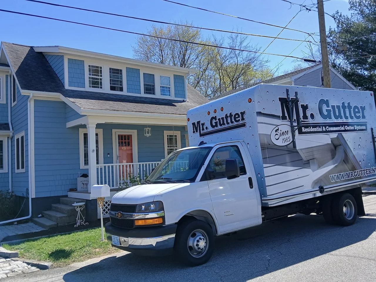 Mr. Gutter trucks at a job