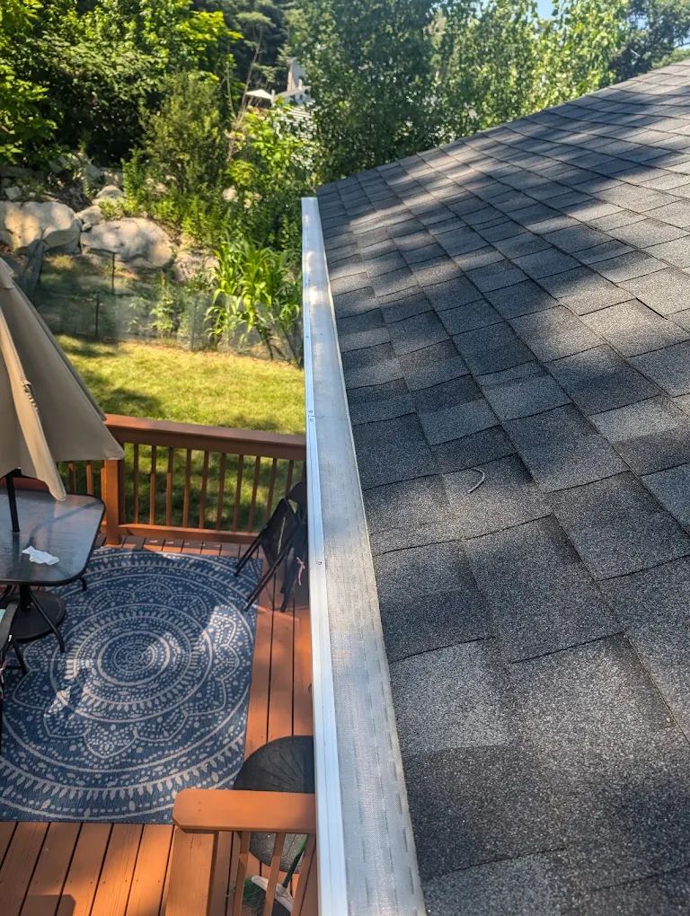 Gutter guard installed by Mr. Gutter along a roof edge