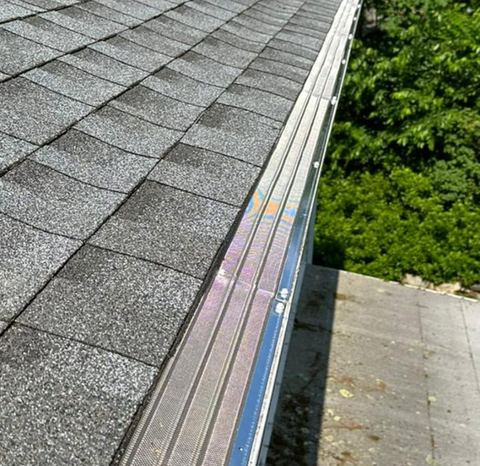 All Mesh Pro stainless steel mesh gutter guard on a roof edge