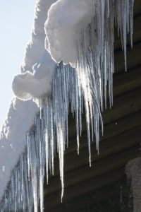 rain gutter covered in ice